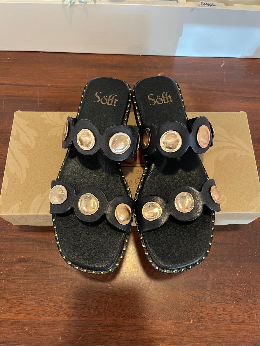 Söfft Black Slide Sandals with Gold-Tone Medallion Accents